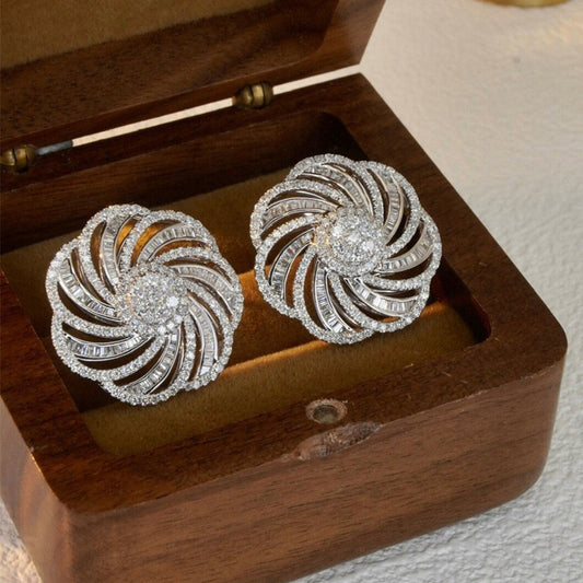 Silver high class stud earrings SJP